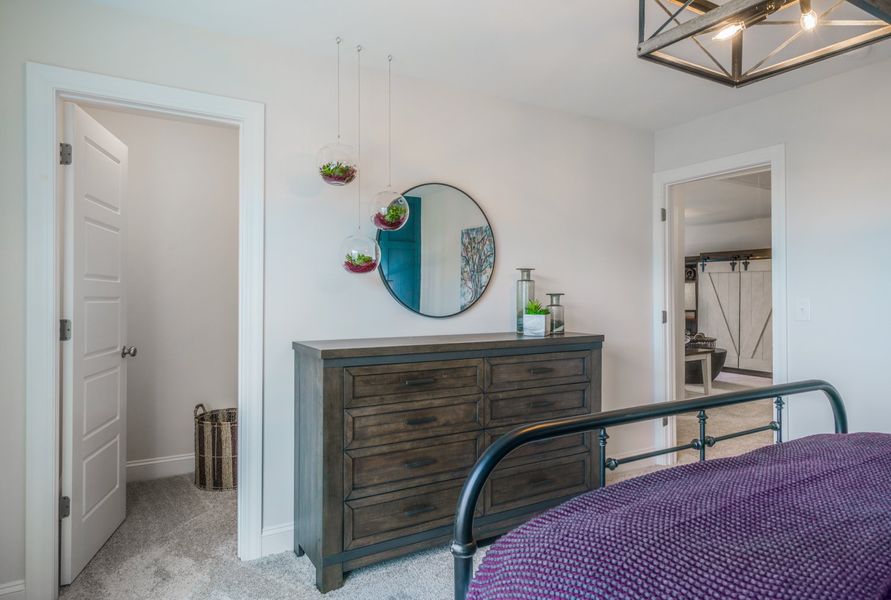 Representative furnished interior of a home built from the The Kensington A by Cothran Homes in Reidville Town Center, Reidville (Image 37).