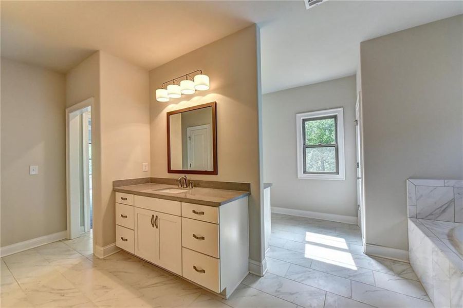 Furnished interior view inside a new home in Bellmoore Park, Duluth (Image 5).
