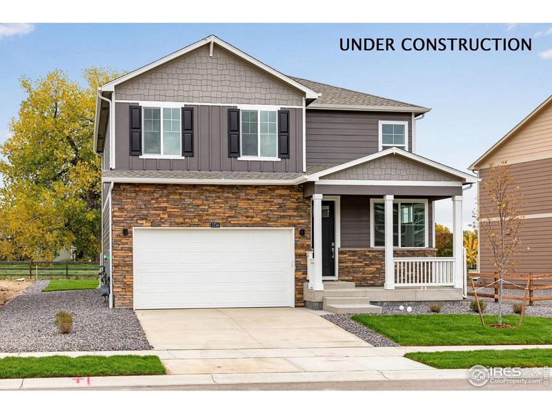 Front exterior of a new home in Hansen Farm, Fort Collins, CO, highlighting curb appeal (Image 19). Front exterior of a new home in Hansen Farm, Fort Collins, CO, highlighting curb appeal (Image 19).