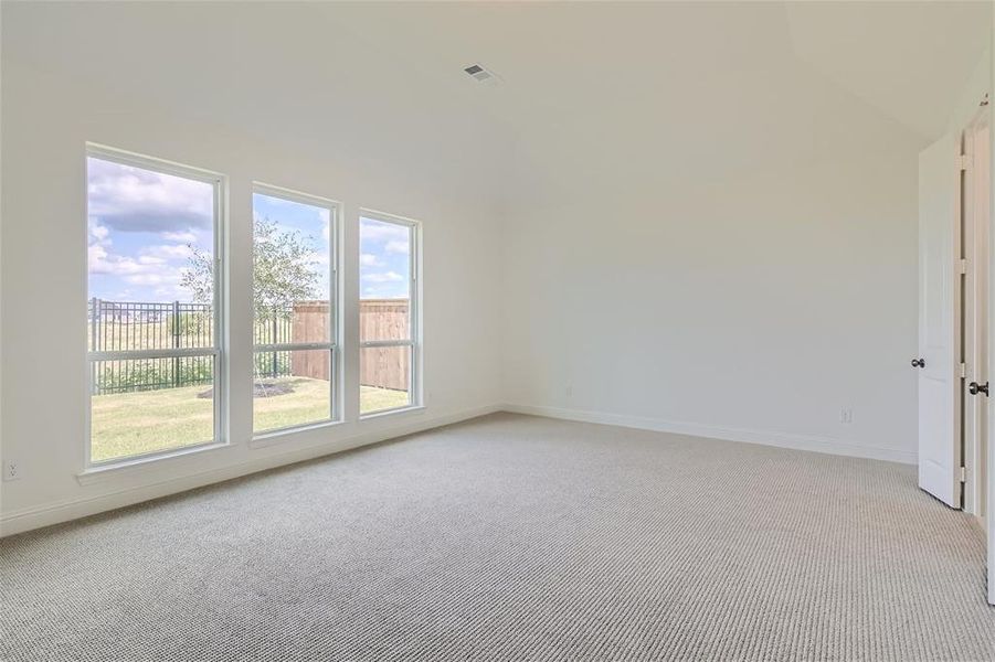 Unfurnished room with carpet flooring