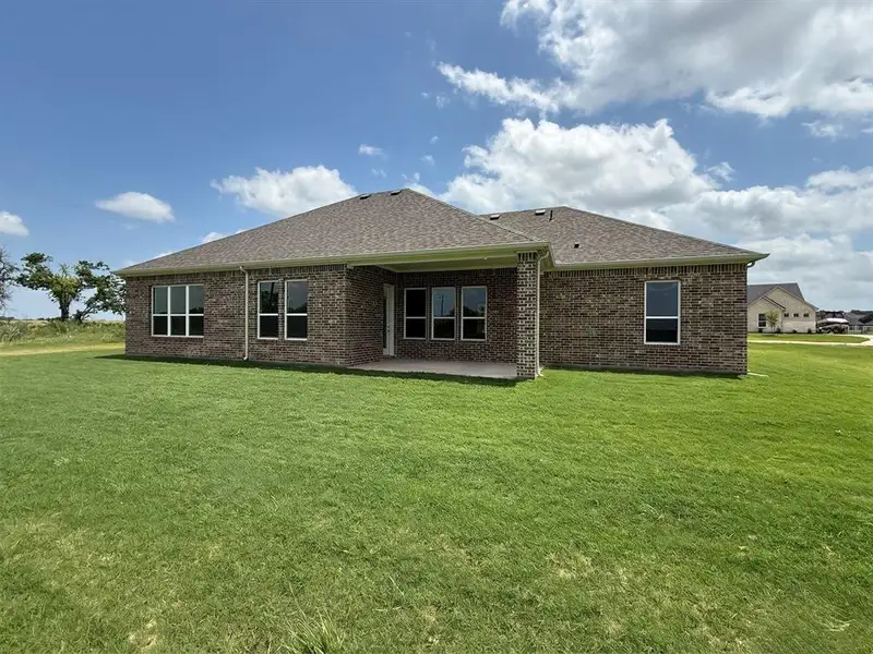 Exterior details and patio area of a home in , Weatherford (Image 3).