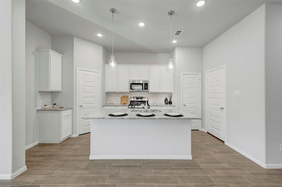 Furnished interior view inside a new home in Sagebrook, Argyle (Image 11). Furnished interior view inside a new home in Sagebrook, Argyle (Image 11).