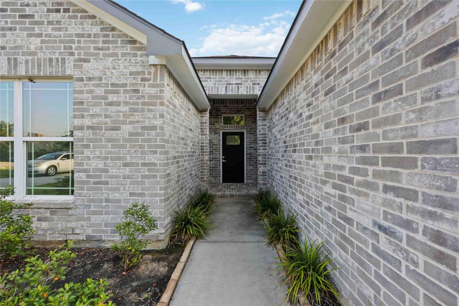 Exterior details and patio area of a home in , Houston (Image 2). Exterior details and patio area of a home in , Houston (Image 2).
