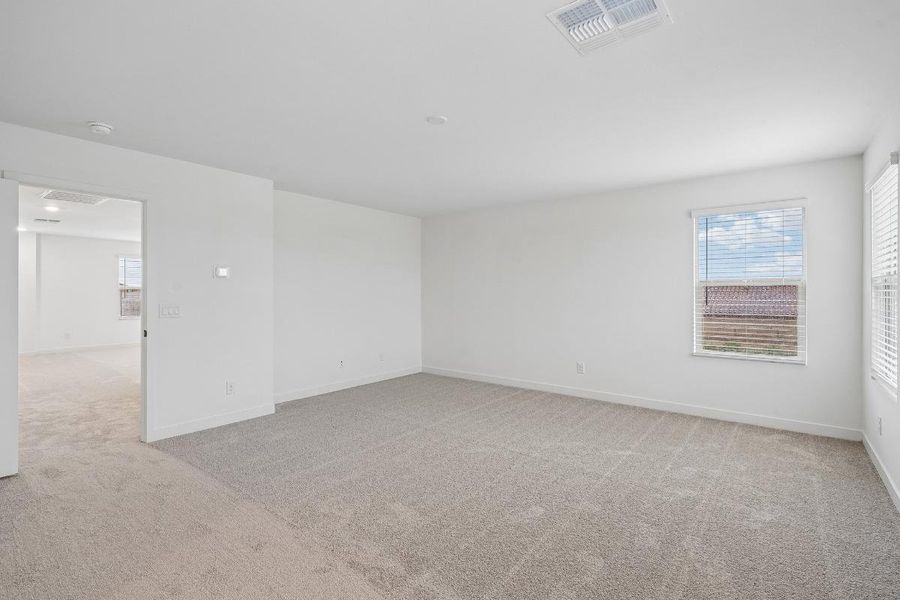 Spacious, unfurnished interior of a new home in The Enclaves at Sonrisa, Queen Creek (Image 10).