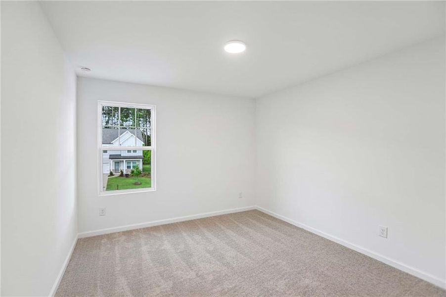 Spacious, unfurnished interior of a new home in The Pointe at Heron Bay, Locust Grove (Image 32).