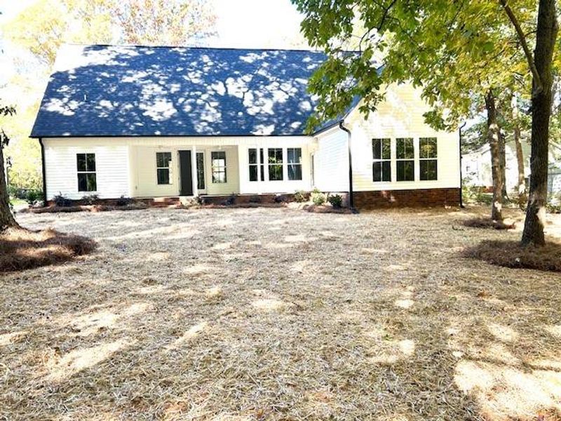 Front exterior of a new home in , Concord, NC, highlighting curb appeal (Image 1). Front exterior of a new home in , Concord, NC, highlighting curb appeal (Image 1).