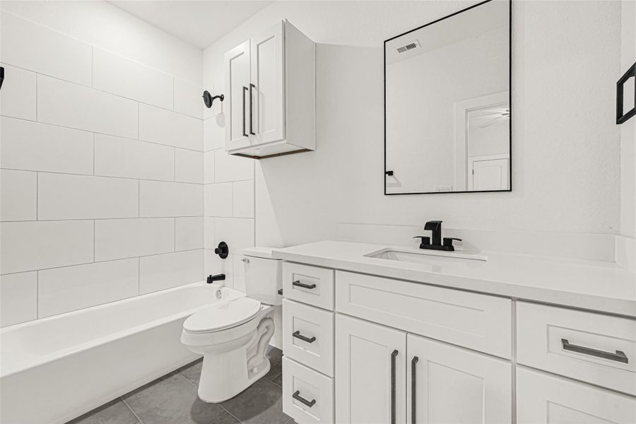 Secondary bedroom en-suite bath Secondary bedroom en-suite bath