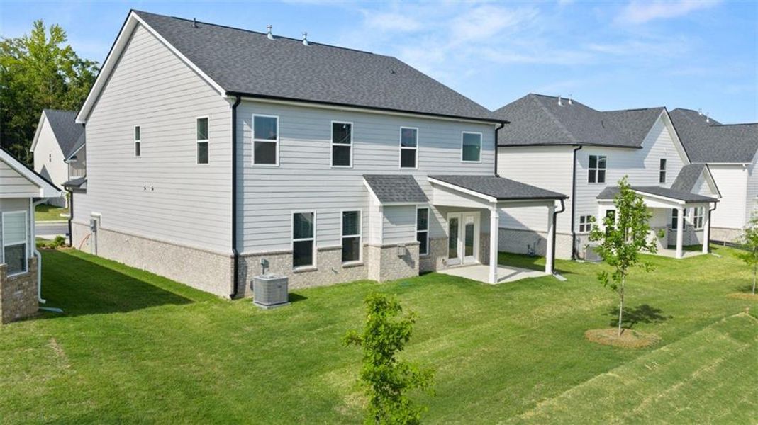 Exterior details and patio area of a home in The Gates at Pates Creek, Hampton (Image 24).