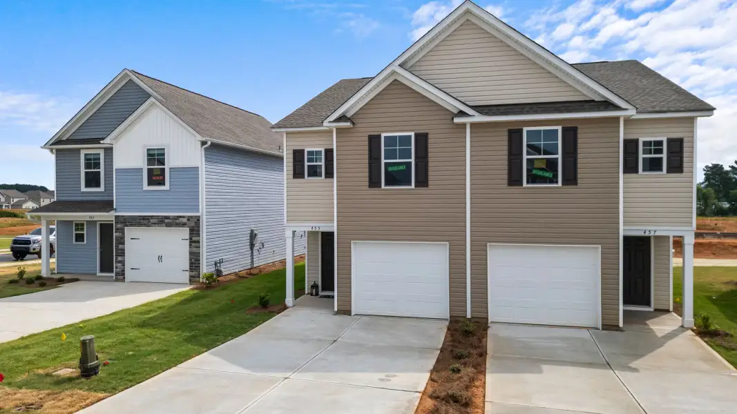 Front exterior of a new home in Champions Village at Cherry Hill, Pendleton, SC, highlighting curb appeal (Image 27).