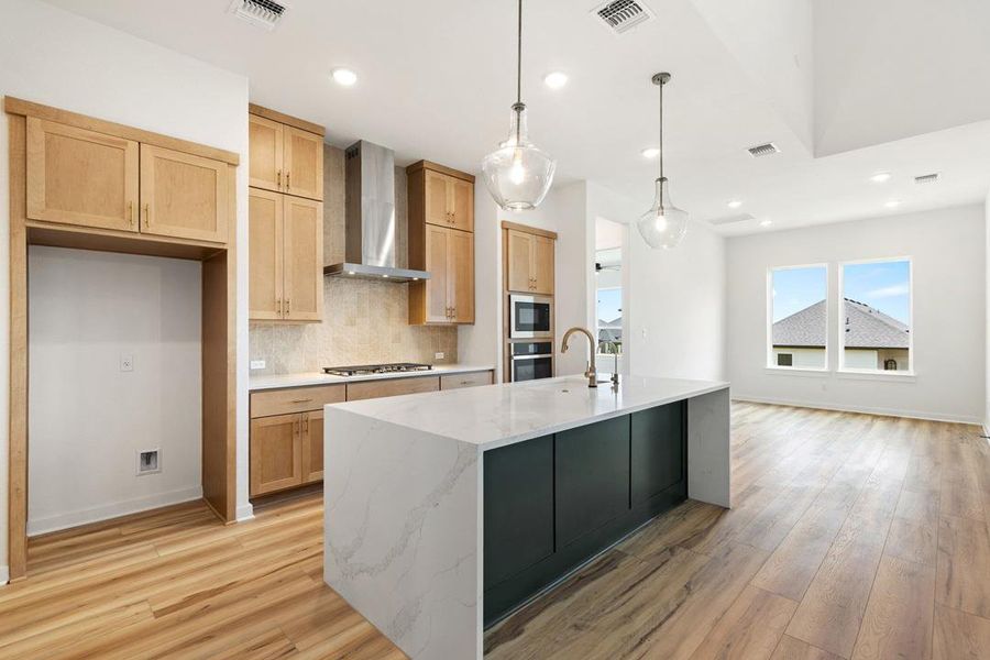 Furnished interior view inside a new home in Heritage, Dripping Springs (Image 4).