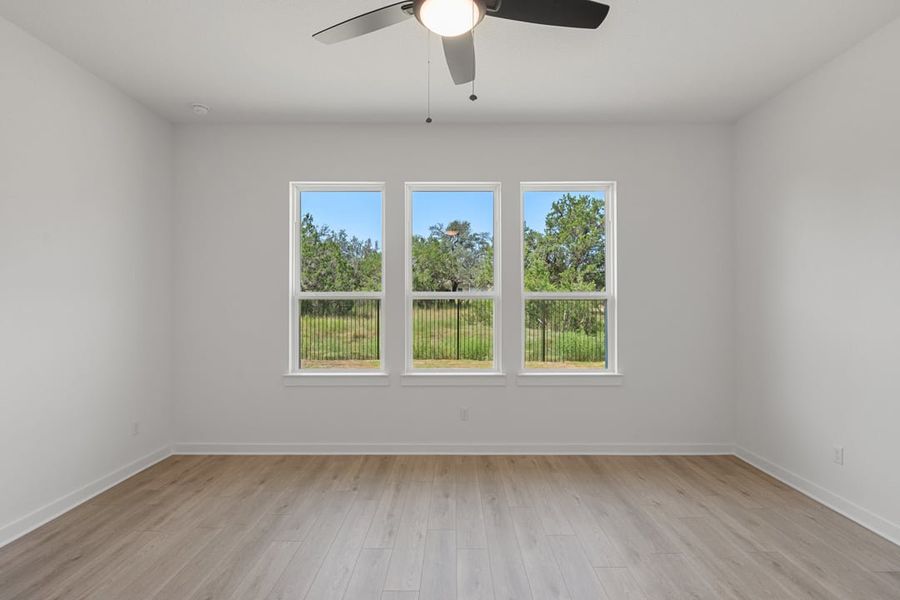 Spacious, unfurnished interior of a new home in Capitol Collection at Lariat, Liberty Hill (Image 36).