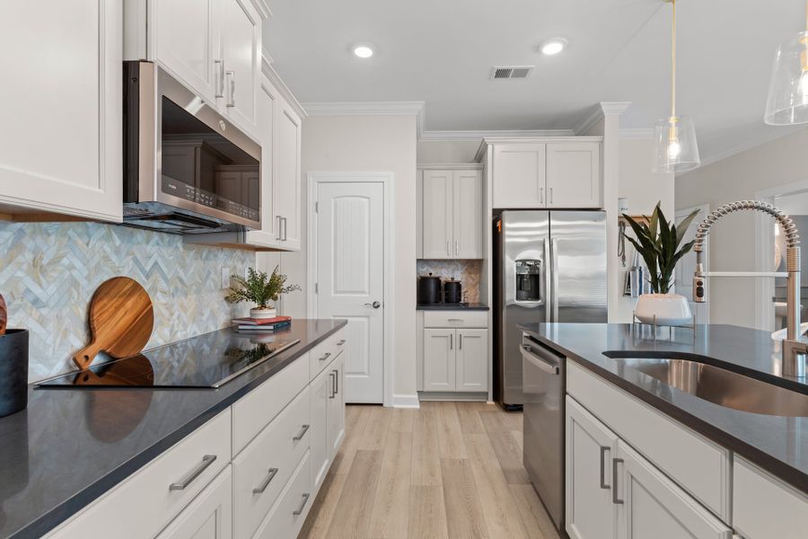 Representative furnished interior of a home built from the The Hibiscus by Chesapeake Homes in Coastal Club of the Carolinas, Calabash (Image 13).
