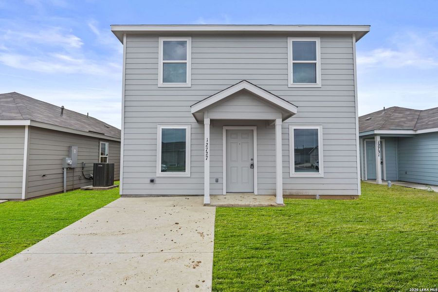 Exterior details and patio area of a home in Spring Grove, St. Hedwig (Image 2).