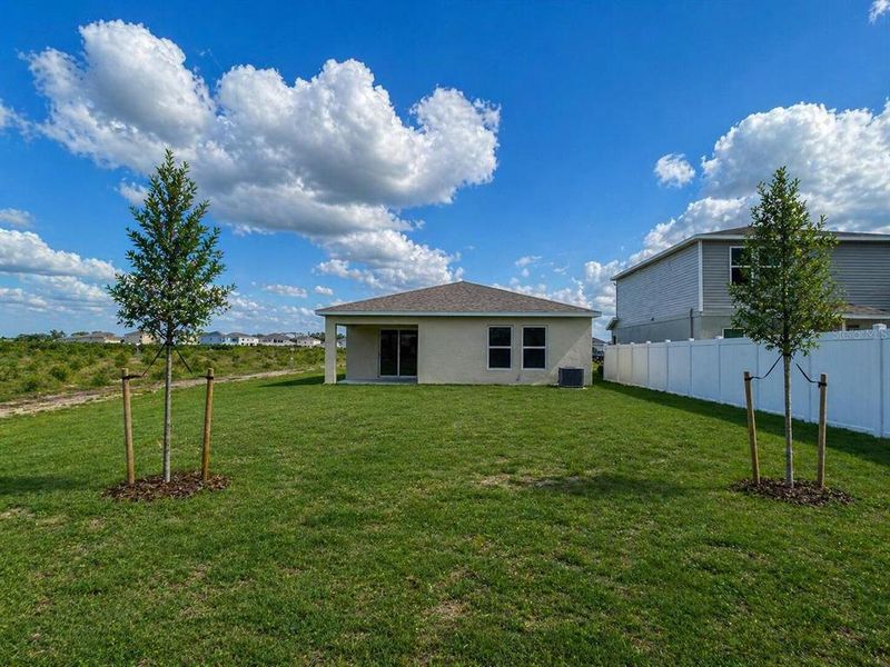 Exterior details and patio area of a home in Eagle Hammock, Eagle Lake (Image 4).