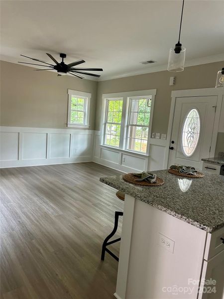 ADULiving area and kitchen / open floor plan