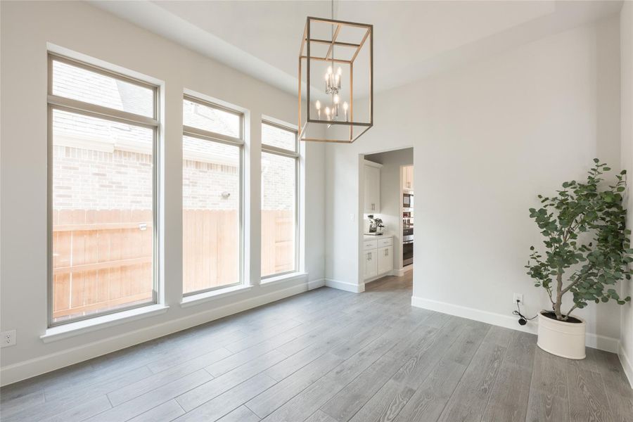 The space is open for all your formal events with a view into the adjacent kitchen area, ideal for versatile use like a coffee bar The space is open for all your formal events with a view into the adjacent kitchen area, ideal for versatile use like a coffee bar