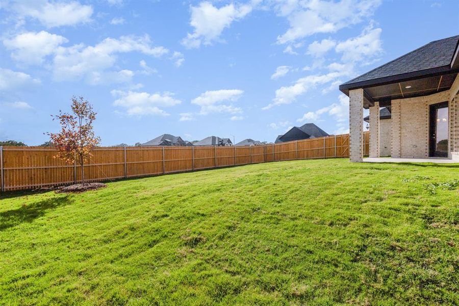 Exterior details and patio area of a home in Ten Mile Creek Estates, DeSoto (Image 3).