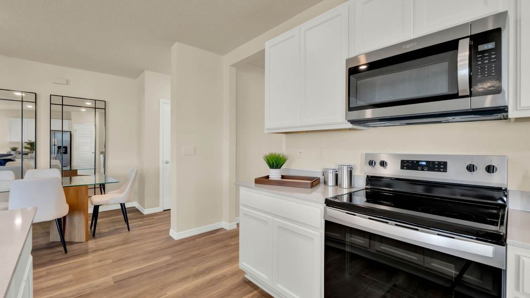 Representative furnished interior of a home built from the Lakeside by D.R. Horton in Sagewood, Apopka (Image 14).