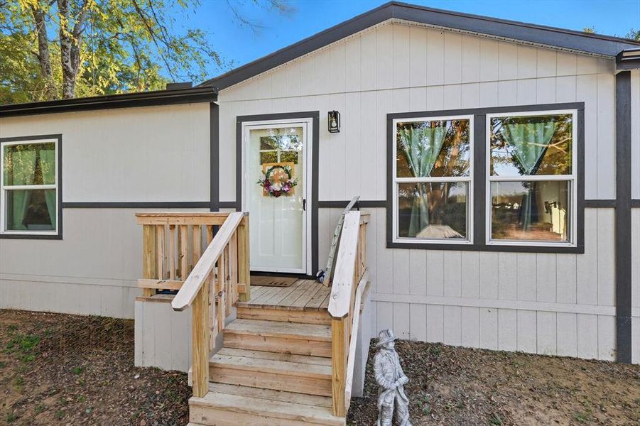 Doorway to property with a deck Doorway to property with a deck