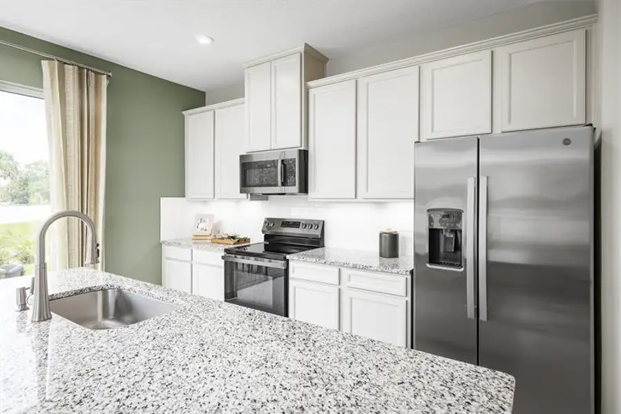 Representative furnished interior of a home built from the Mayshore by Ryan Homes in Pine Pointe at Astonia, Davenport (Image 7).