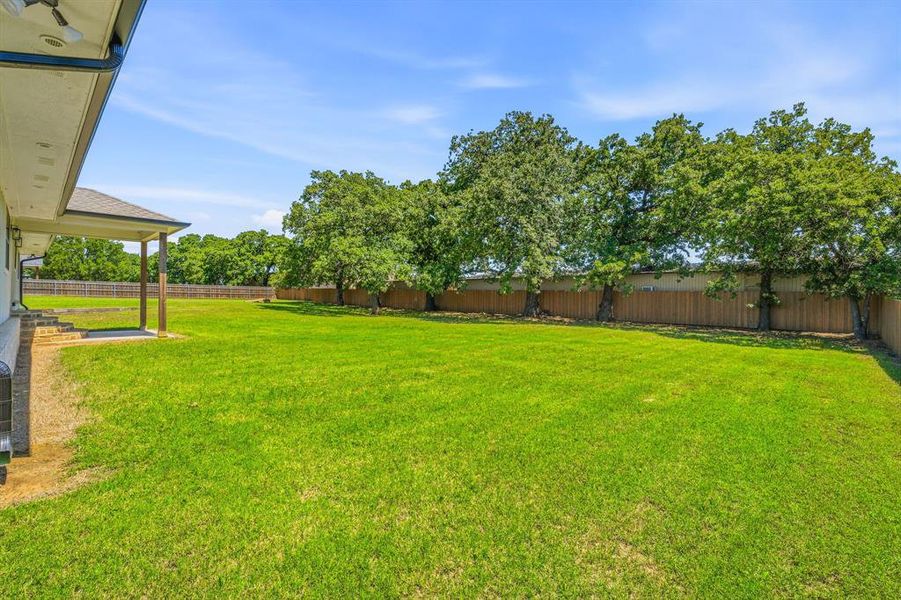 Exterior details and patio area of a home in , Stephenville (Image 3).