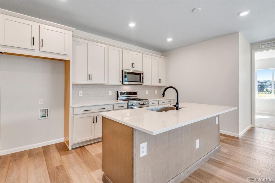 Furnished interior view inside a new home in Wild Oak at The Canyons, Castle Pines (Image 4). Furnished interior view inside a new home in Wild Oak at The Canyons, Castle Pines (Image 4).