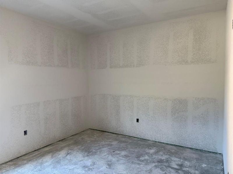 Empty room with concrete floors