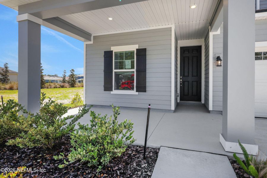 Exterior details and patio area of a home in Hyland Trail, Green Cove Springs (Image 26).
