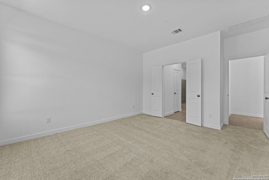 Spacious, unfurnished interior of a new home in Waterwheel: Coastline Collection, San Antonio (Image 15).