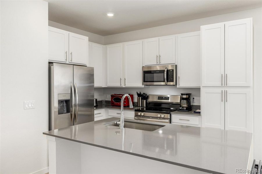 Furnished interior view inside a new home in Green Valley Ranch Active Adult, Aurora (Image 6).