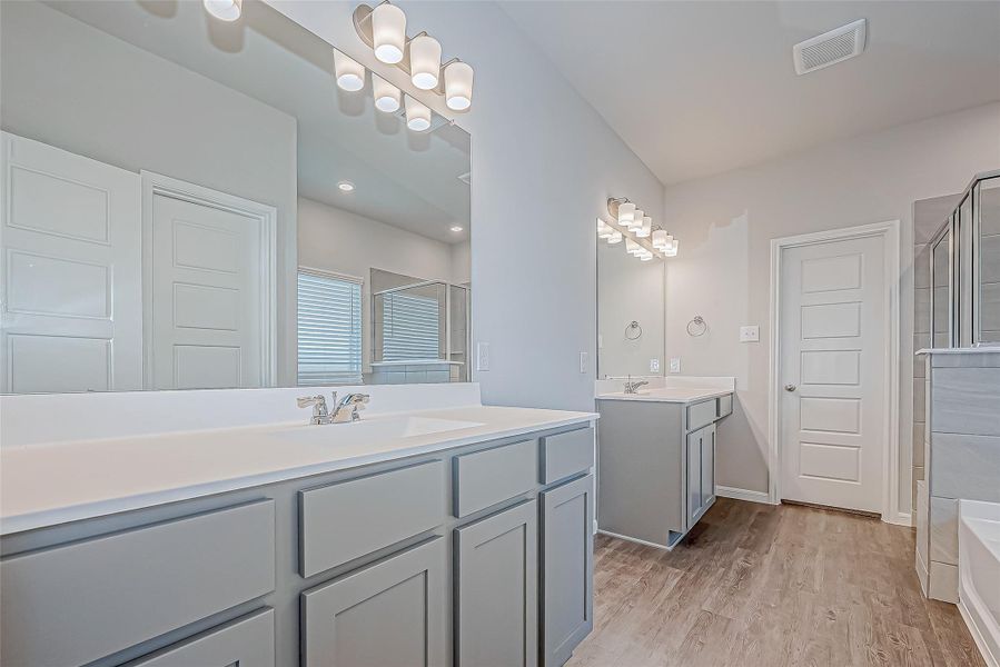 Furnished interior view inside a new home in Mill Creek Trails, Magnolia (Image 10).
