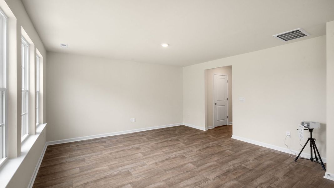 Representative unfurnished interior of a home built from the Darwin by D.R. Horton in Willow Mill, Thomasville (Image 9).