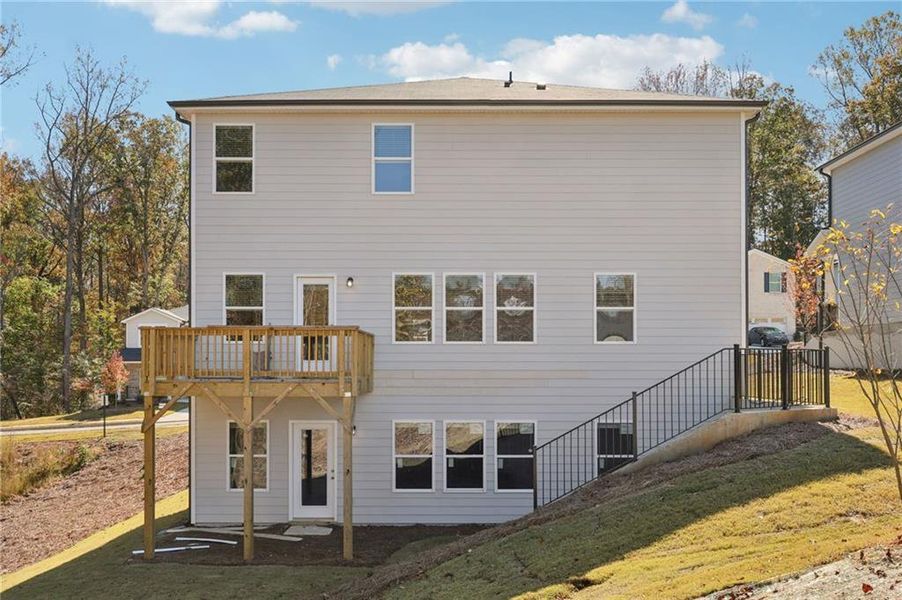 Exterior details and patio area of a home in The Oaks at Dawson, Dawsonville (Image 2).