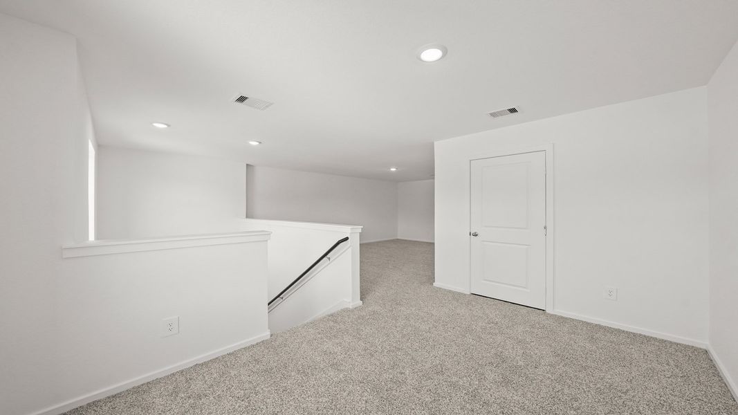 Representative unfurnished interior of a home built from the Callahan by D.R. Horton in Lexington Heights, Willis (Image 21).
