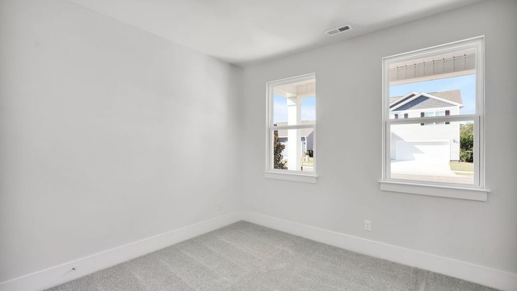 Representative unfurnished interior of a home built from the ACADIA by D.R. Horton in Rolling Hills, Bolivia (Image 18).