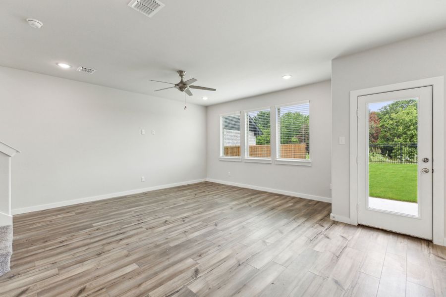 Living Room in the Hickory home plan by Trophy Signature Homes – REPRESENTATIVE PHOTO