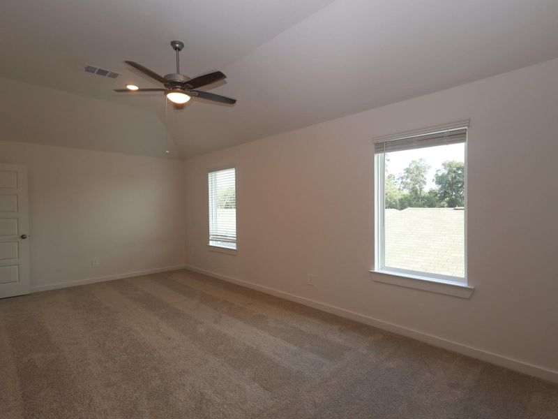 Spacious, unfurnished interior of a new home in Pinewood at Grand Texas, New Caney (Image 21).