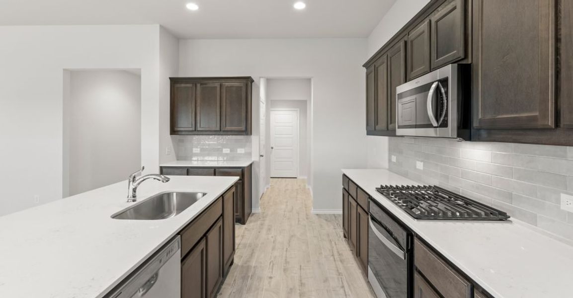 Representative exterior photo of a completed home built from the Hampton II by Impression Homes in Stone Eagle, Azle, TX (Image 6). Representative exterior photo of a completed home built from the Hampton II by Impression Homes in Stone Eagle, Azle, TX (Image 6).