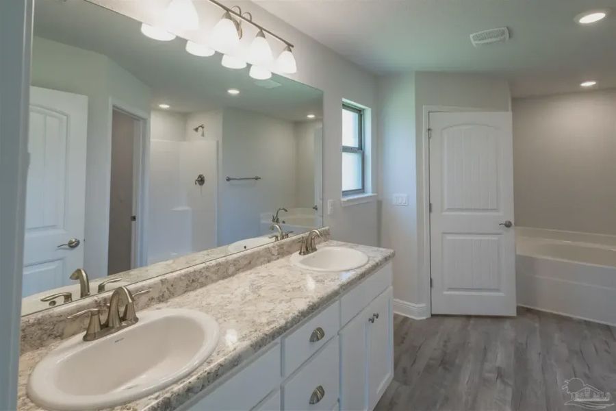 Representative furnished interior of a home built from the Plan 1810 by Adams Homes in Ashton View, Crestview (Image 6).