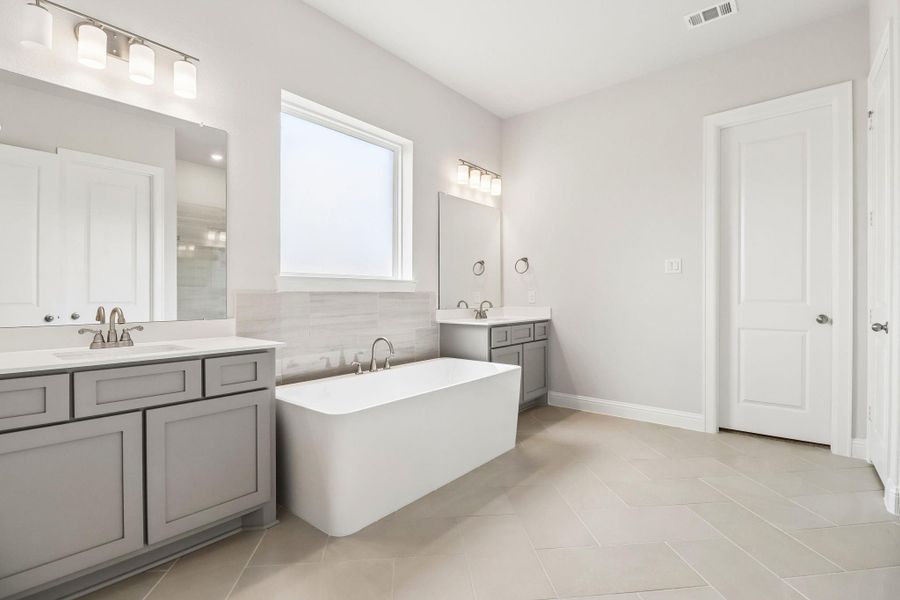 Furnished interior view inside a new home in Woodhavyn 60', Magnolia (Image 13).