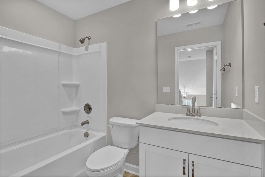 Furnished interior view inside a new home in Grand Park, Leland (Image 11).