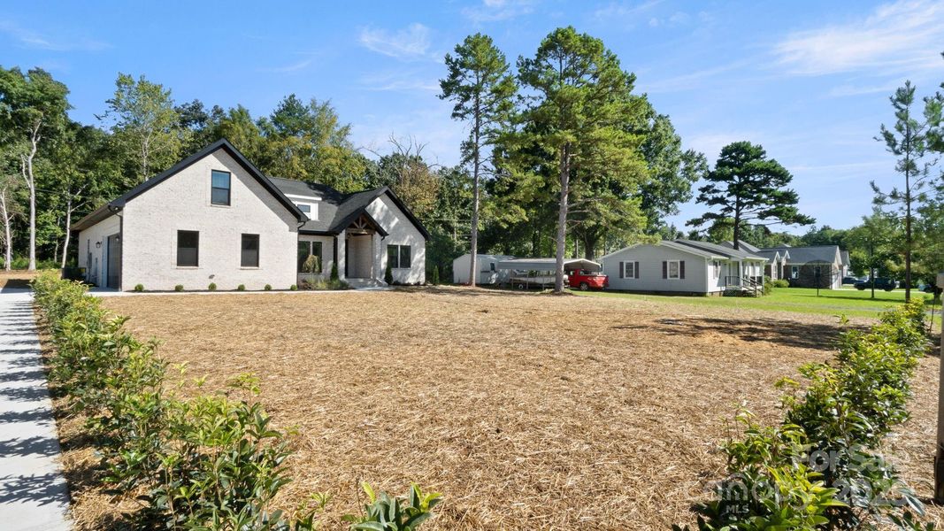 Front exterior of a new home in , Indian Trail, NC, highlighting curb appeal (Image 19). Front exterior of a new home in , Indian Trail, NC, highlighting curb appeal (Image 19).