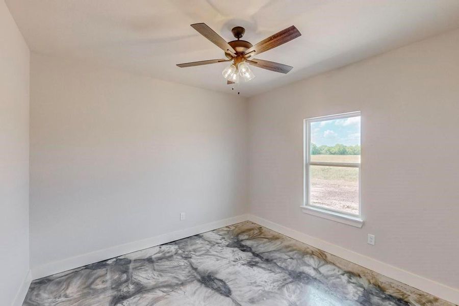 Unfurnished room with ceiling fan