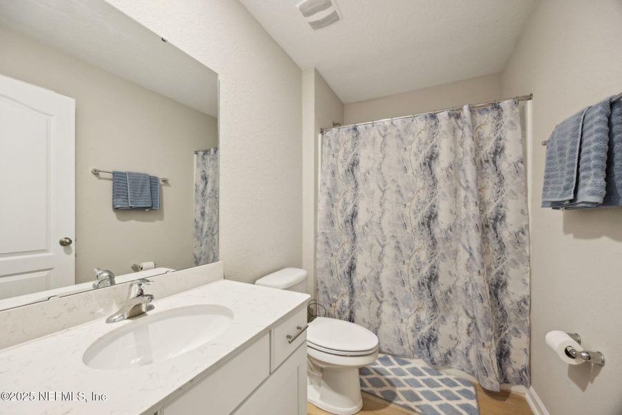 Furnished interior view inside a new home in Pecan Ridge, Jacksonville (Image 28).