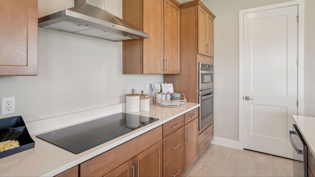 Representative furnished interior of a home built from the Sweetgum by DRB Homes in Ardisia Park, New Smyrna Beach (Image 19).