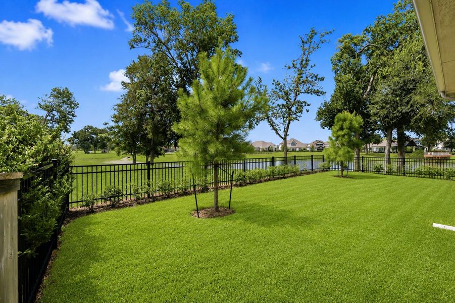 The expansive Backyard is fully fenced, creating a private and secure outdoor retreat with plenty of space to relax, play, and entertain. Enhancing both the beauty and convenience of the landscape, a whole-yard sprinkler system helps keep the lawn and grounds lush, green, and meticulously maintained year-round.