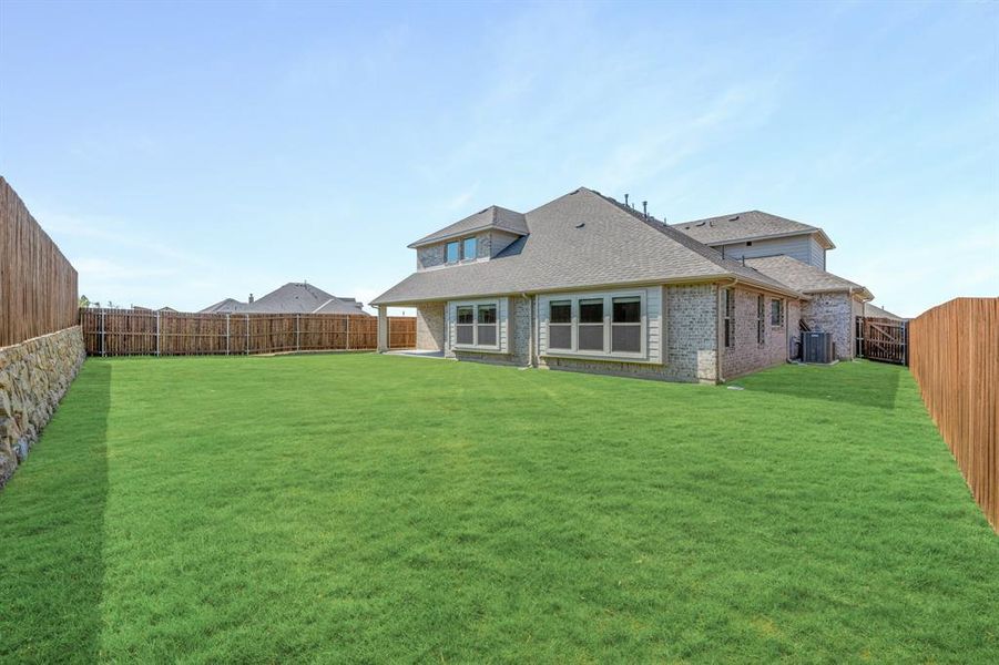 Front exterior of a new home in Parks at Panchasarp Farms 65, Burleson, TX, highlighting curb appeal (Image 1). Front exterior of a new home in Parks at Panchasarp Farms 65, Burleson, TX, highlighting curb appeal (Image 1).