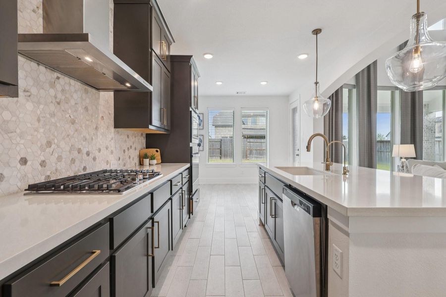 Large island and plenty of cabinets.