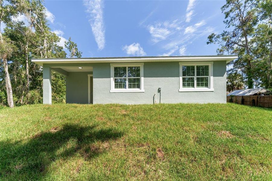 Front exterior of a new home in , Belleview, FL, highlighting curb appeal (Image 23).