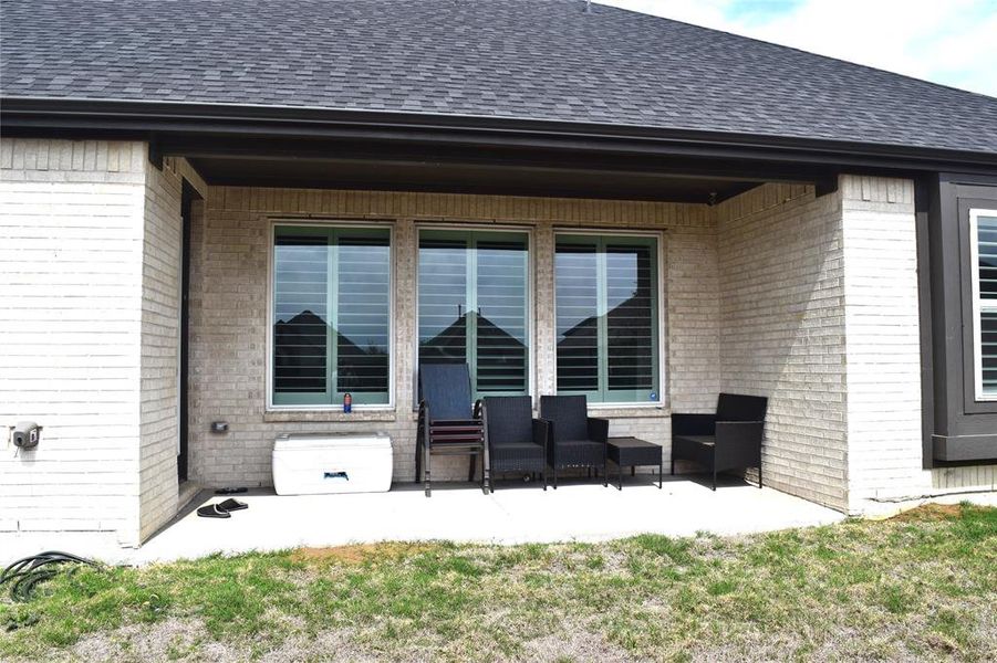 Exterior details and patio area of a home in , Hickory Creek (Image 30).